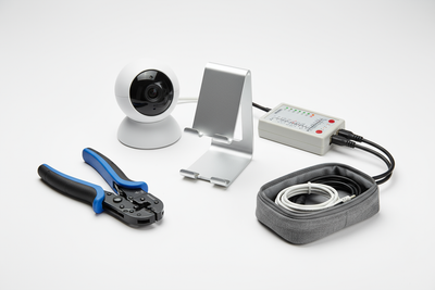 phone holder, ethernet cable crimping tool, wire tested, indoor camera and small storage bag